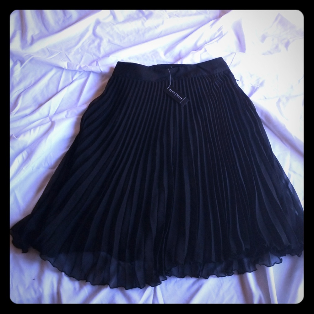 Sheer pleated black skirt